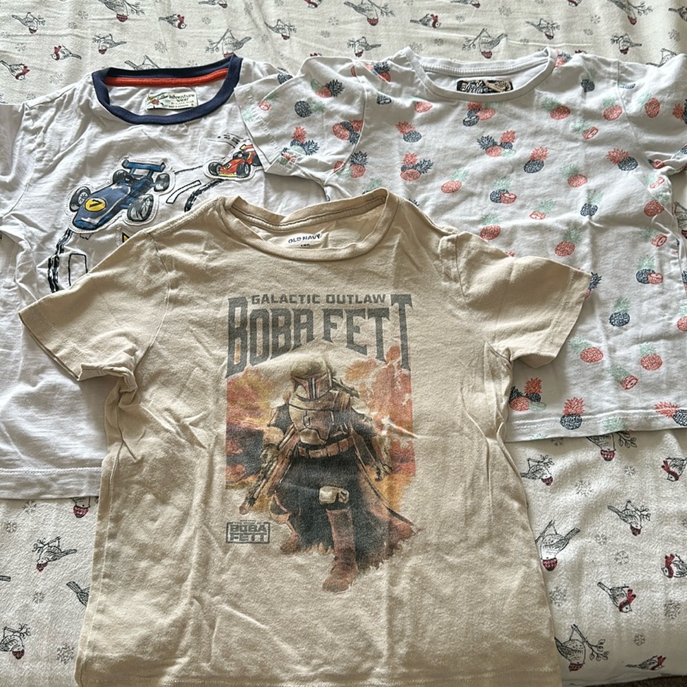 Assorted T-shirts for 6 years old boy for grab.